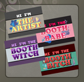 Deerbits Studios booth name tags with colorful badges on a display board, used for events or conferences.